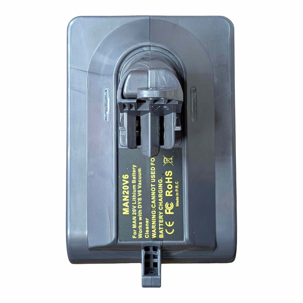 Craftsman 20V to Dyson V6 battery adapter - Dyson tool-side stem from above, warning label on the top face