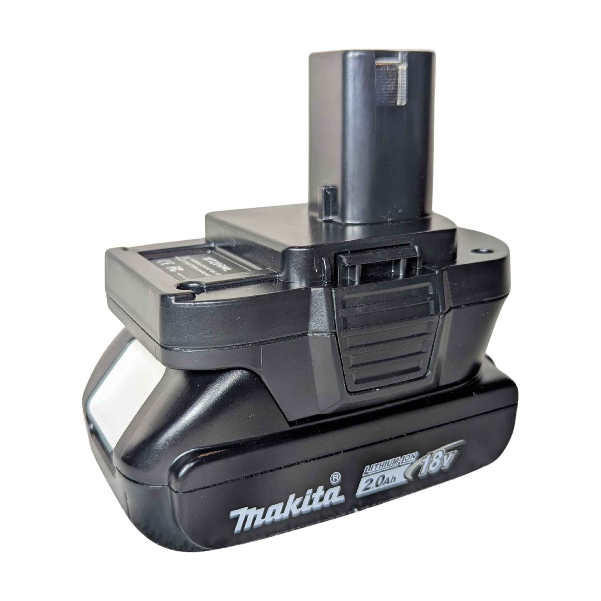 Makita 18V LXT to Ryobi 18V ONE+ battery adapter - fitted to the Makita 18V LXT battery, vent ribs and latch in view