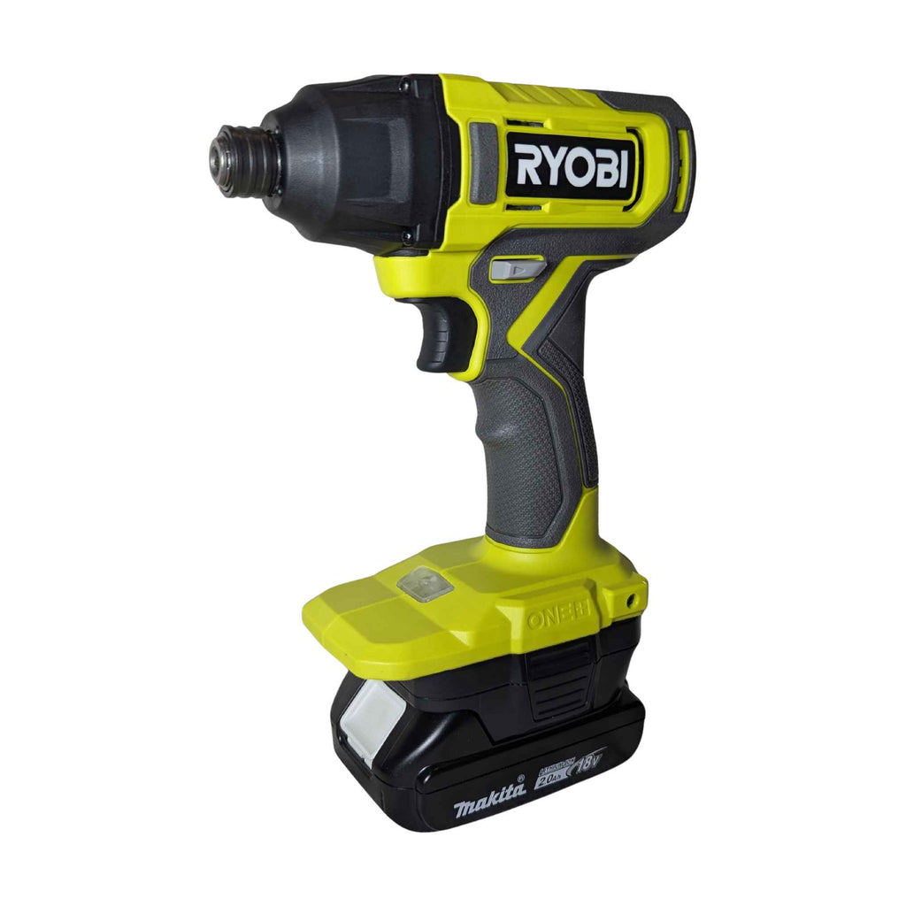 Makita 18V LXT to Ryobi 18V ONE+ battery adapter - installed on a Ryobi impact driver with the Makita battery attached