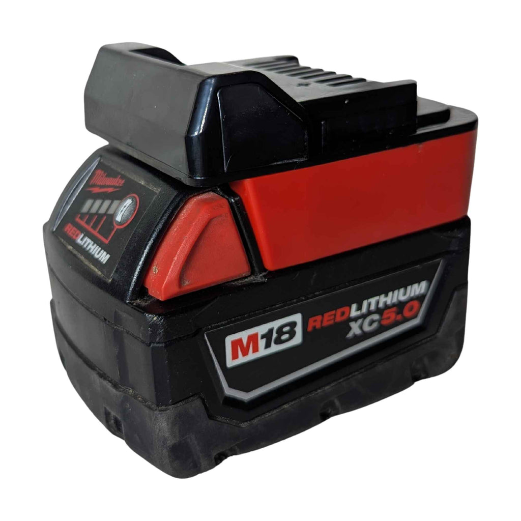 Milwaukee M18 to Metabo HPT 18V battery adapter - fitted to the Milwaukee M18 battery, tool-side block facing up
