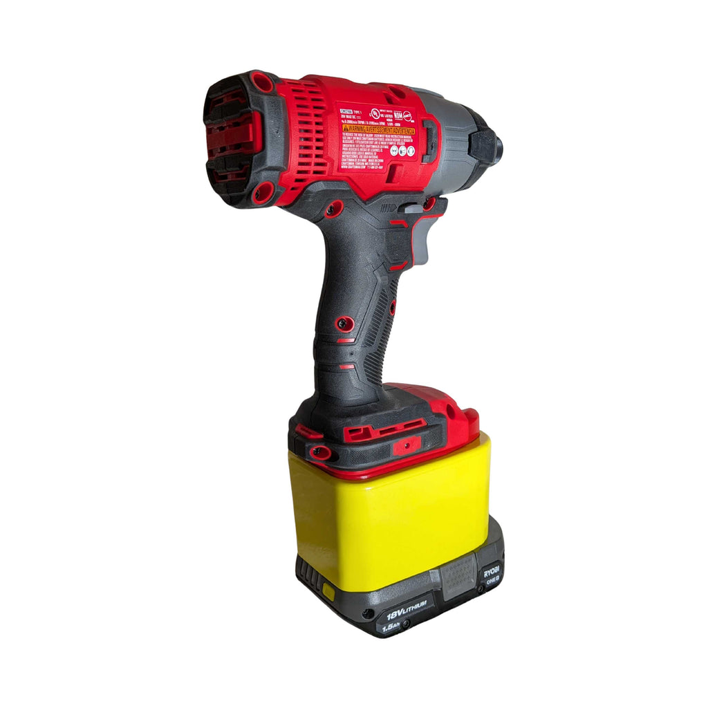 Ryobi 18V ONE+ to Craftsman 20V battery adapter - installed on an impact driver with the battery below, rear view